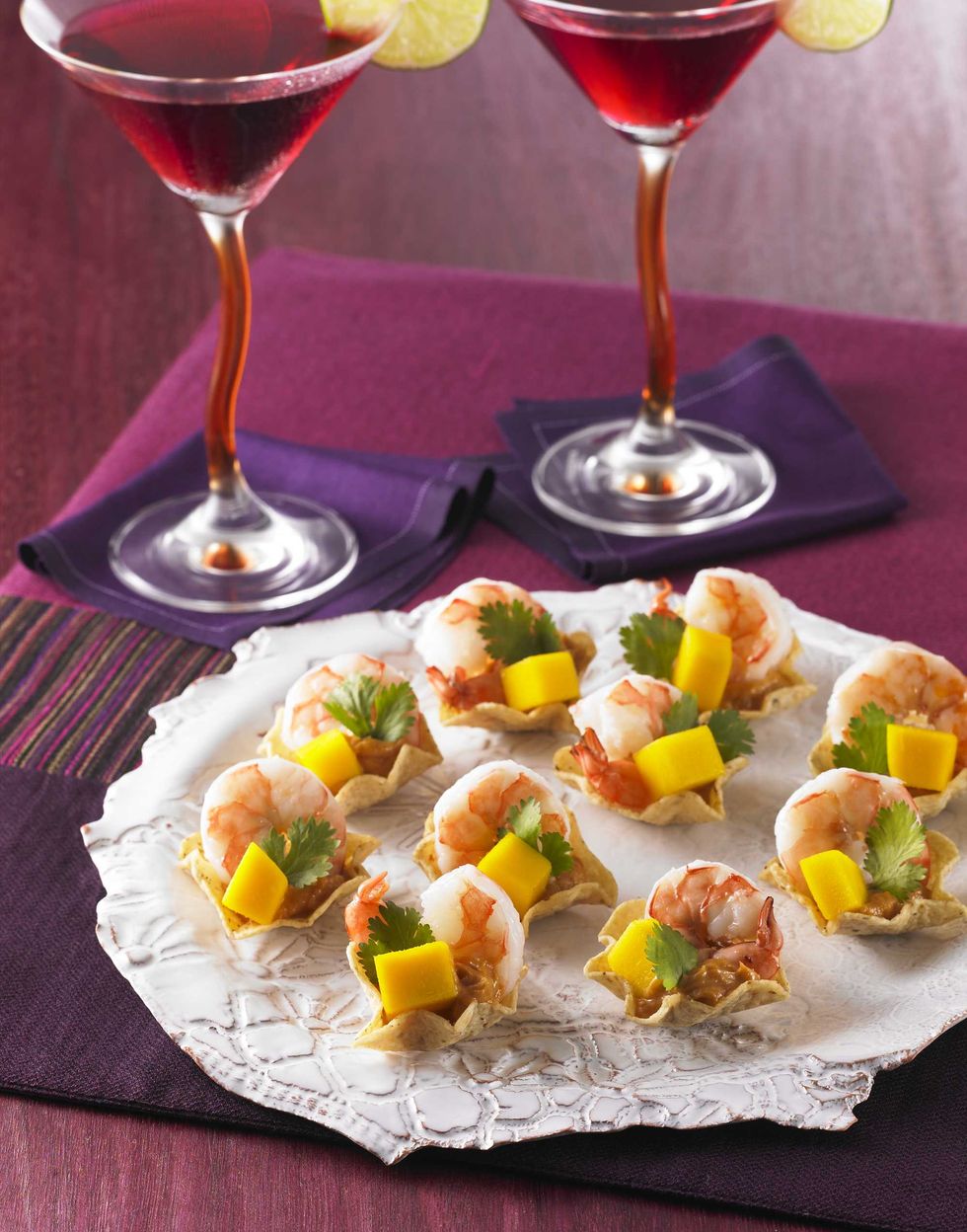 Bouch\u00e9es de crevettes, mangue et arachides.
