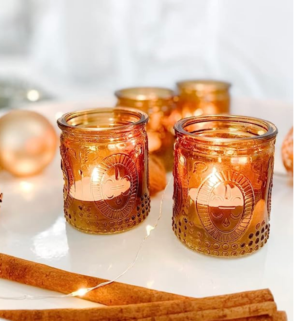 Lot de 4 photophores vintage en verre ambr\u00e9.