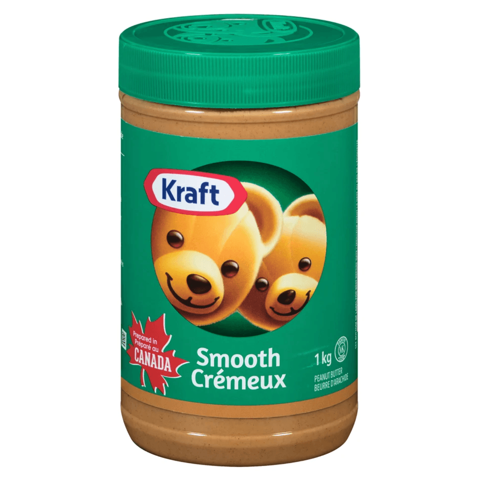 Pot de beurre d'arachide Kraft, format de 1kg, sur fond blanc.