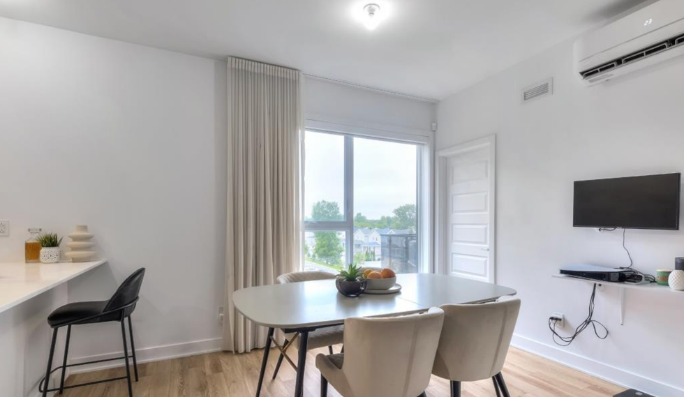 Salle \u00e0 manger du condo des gagnants d'OD 2020.