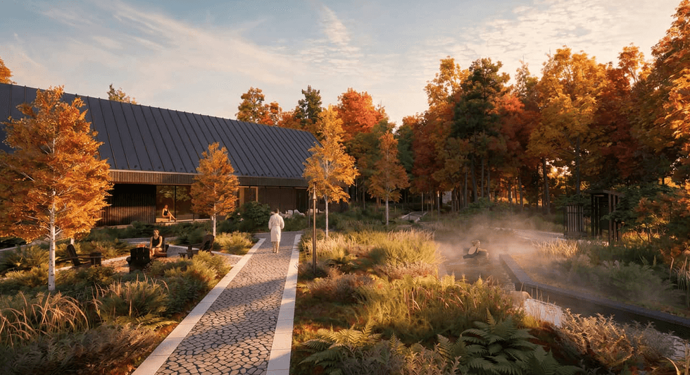 Sentier menant aux bassins thermaux ext\u00e9rieurs du Str\u00f8m Saint-Sauveur et le bassin lazy river en automne