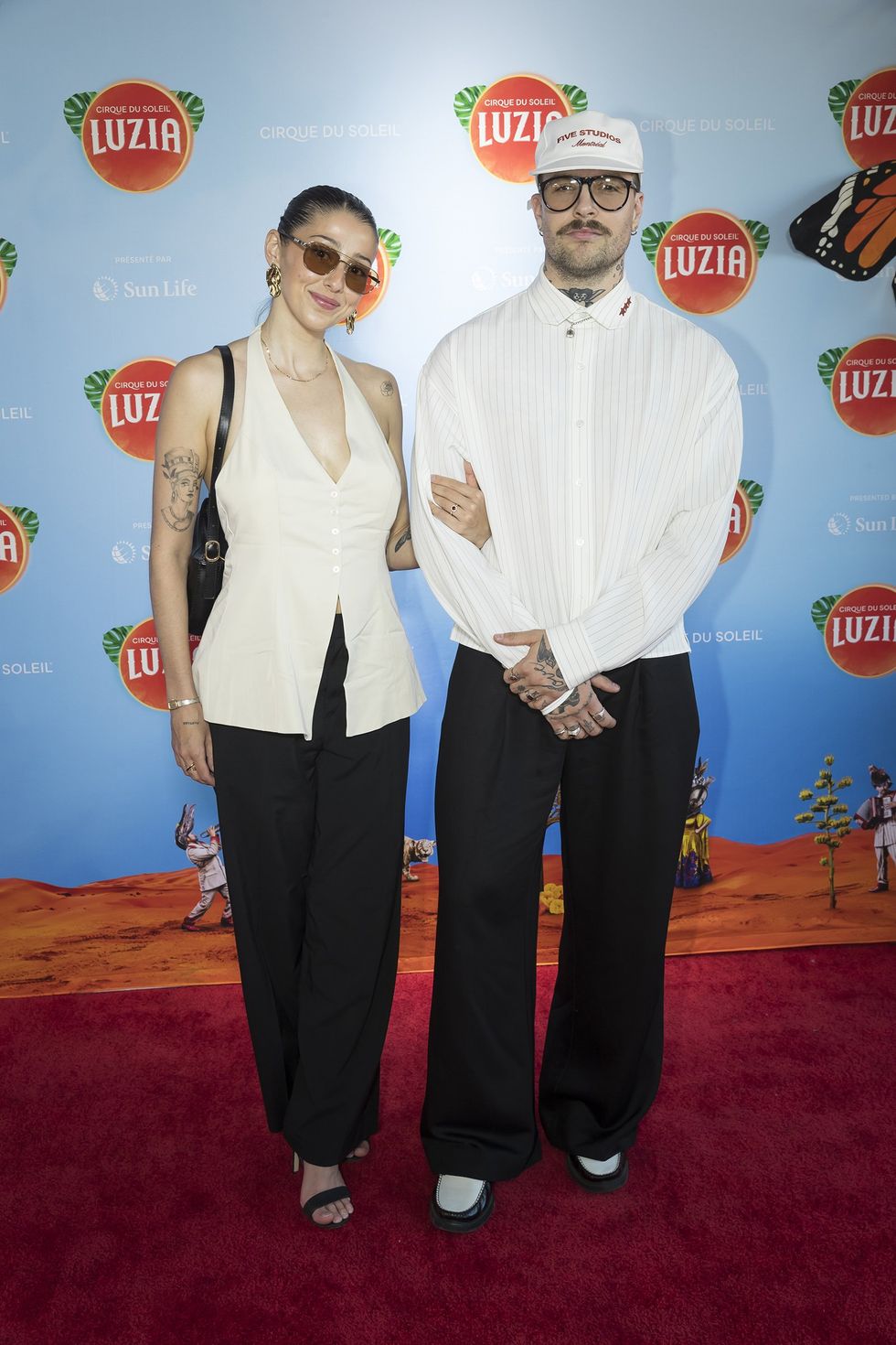 Stacey Giannopoulos et Jamie Watt sur le tapis rouge de Luzia du Cirque du Soleil.