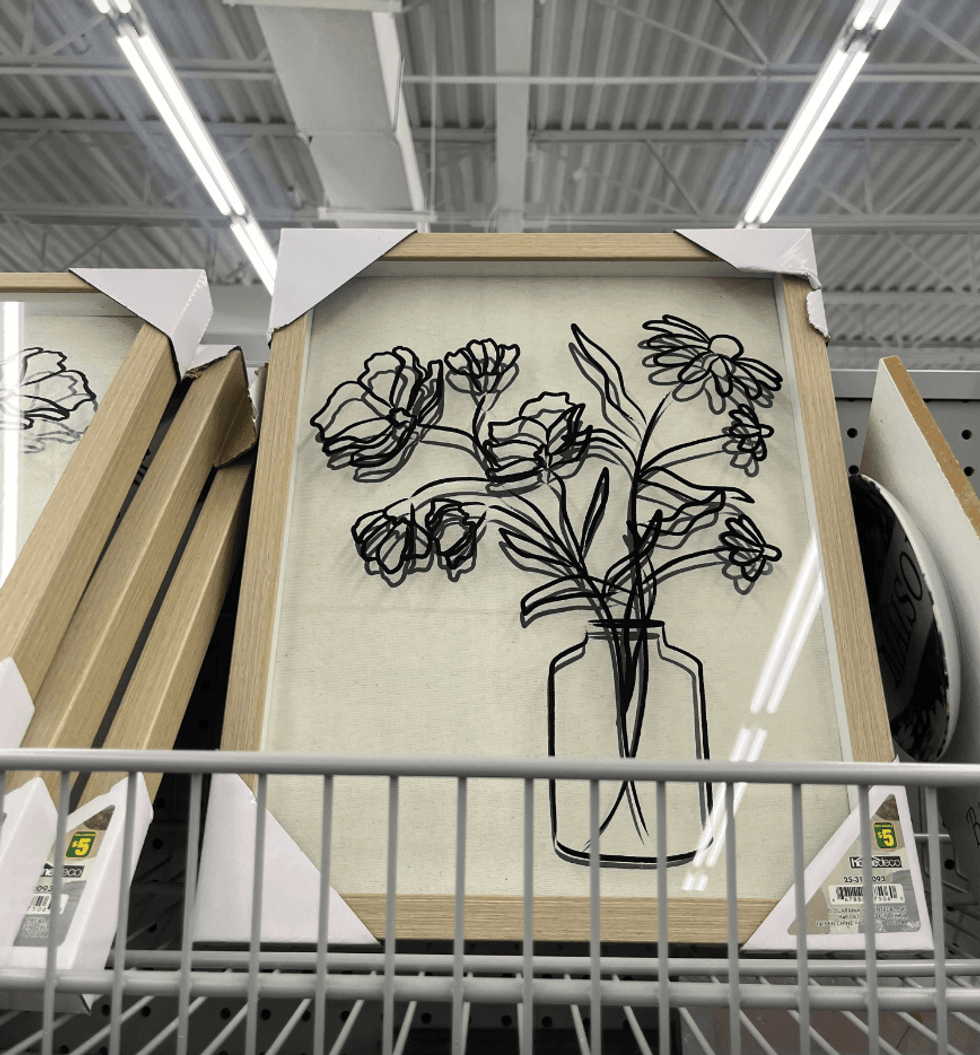 \u200bCadre au design minimaliste de fleurs.