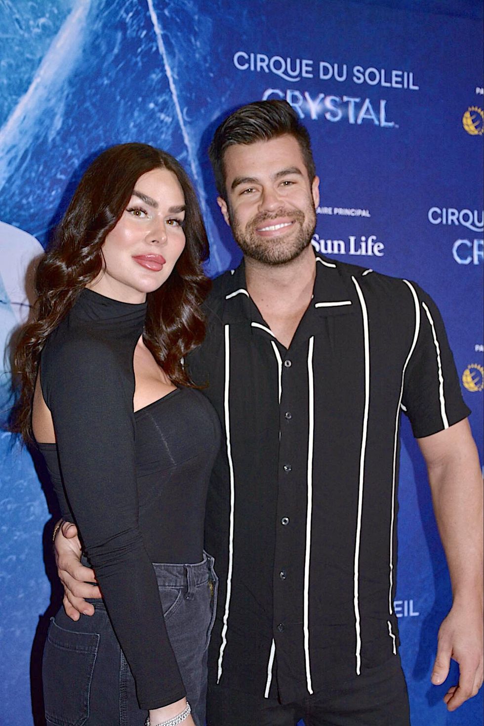 \u200bGabrielle Marion et son fianc\u00e9 sur le tapis rouge du Cirque du Soleil.