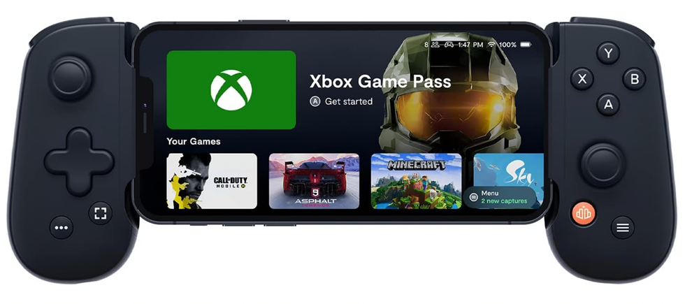 \u200bManette de jeu mobile pour iPhone noire, avec le t\u00e9l\u00e9phone \u00e0 titre indicatif.